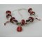 Pulseira de prata com contas vermelhas de joaninha