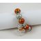 Pulseira de prata com missangas e laço cor-de-laranja