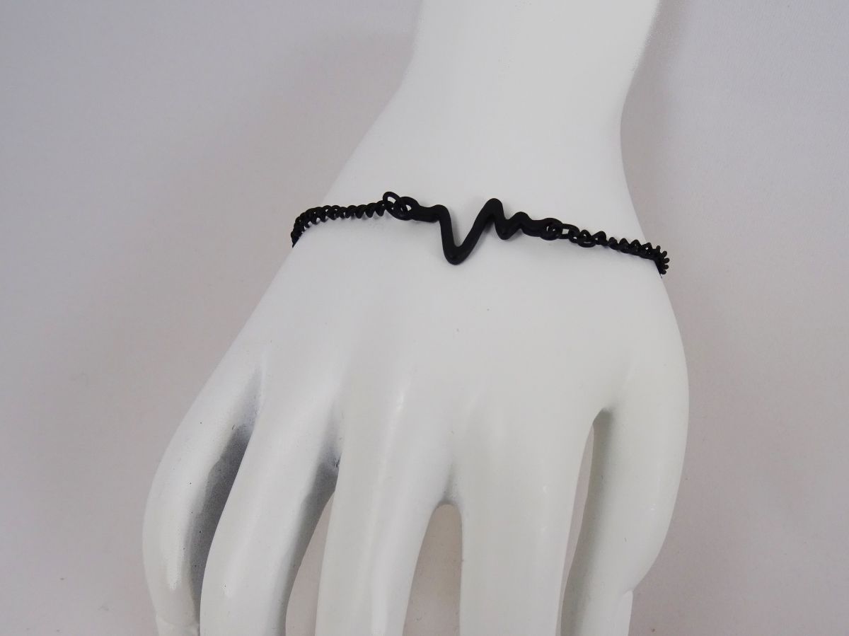 Ondas com desenho de pulseira fina preta