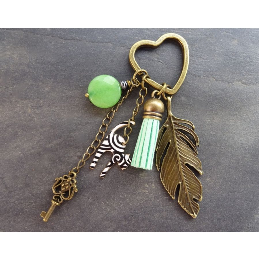 Porta-chaves de gato preto e branco com pompom verde