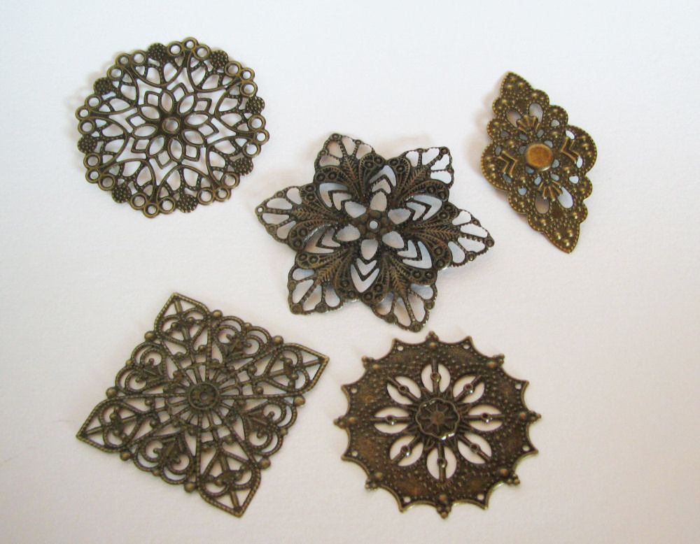 Conjunto de 5 estampas de bronze envelhecido de várias formas
