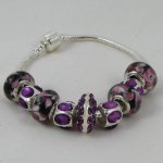 Pulseira de prata com pérolas e strass púrpura